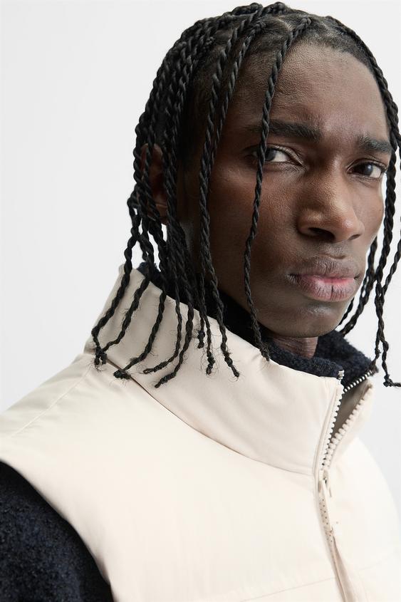 WHITE SLEEVELESS DOWN JACKET